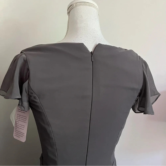 AFTER SIX • NWT FLUTTER SLEEVE FAUX WRAP CHIFFON DRESS IN CAVIAR GRAY - Picture 9 of 9